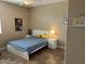 Bedroom with ceiling fan, window, and tiled floor at 2585 E Carob Dr, Gilbert, AZ 85298