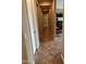 Hallway with beautiful tile floors leading to the rest of the home at 2585 E Carob Dr, Gilbert, AZ 85298
