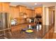 Spacious kitchen featuring granite countertops, stainless steel appliances, and ample storage at 2585 E Carob Dr, Gilbert, AZ 85298