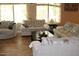 Spacious living room with comfortable seating and tile flooring at 2585 E Carob Dr, Gilbert, AZ 85298
