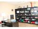 A home office with built in bookshelves and a workspace at 2585 E Carob Dr, Gilbert, AZ 85298