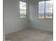 Bedroom with windows and space for personalization at 26119 N 23Rd Ave, Phoenix, AZ 85085