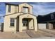 Inviting two-story home with a covered porch entry and neutral stucco exterior finish at 26119 N 23Rd Ave, Phoenix, AZ 85085