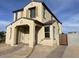 Attractive two-story home with a covered porch, showcasing the exterior design elements at 26119 N 23Rd Ave, Phoenix, AZ 85085