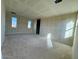 Unfinished large living room with multiple windows and bright natural light at 26119 N 23Rd Ave, Phoenix, AZ 85085