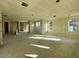 Unfinished large living room featuring large windows and open concept design at 26119 N 23Rd Ave, Phoenix, AZ 85085