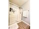 Bathroom featuring a glass shower, and wood flooring at 2821 S Skyline Dr # 156, Mesa, AZ 85212