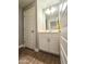 This bathroom has a stylish vanity, great lighting, and practical storage, offering a blend of comfort and style at 2821 S Skyline Dr # 156, Mesa, AZ 85212