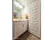 This bathroom boasts a modern vanity, ample storage, and a well-lit mirror, enhanced by a contrasting towel at 2821 S Skyline Dr # 156, Mesa, AZ 85212