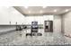 Spacious kitchen with a large island, granite countertops, stainless steel appliances, and white cabinetry at 2821 S Skyline Dr # 156, Mesa, AZ 85212