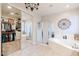 Bathroom features a soaking tub, glass enclosed shower, and a walk-in closet at 3053 S Canfield --, Mesa, AZ 85212