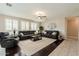 Comfortable living room with stylish furniture and an open view to the hallway at 3053 S Canfield --, Mesa, AZ 85212