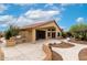 Beautiful backyard features a desert landscape and built-in outdoor grill at 3700 N 149Th Ln, Goodyear, AZ 85395