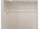 Empty, bright closet with shelving and hanging bar offering storage solutions at 3700 N 149Th Ln, Goodyear, AZ 85395