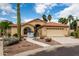 Charming single-story home featuring a two-car garage, desert landscaping, and a red tile roof at 3700 N 149Th Ln, Goodyear, AZ 85395