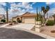 Inviting single-story home with desert landscaping, a two-car garage, and a concrete driveway at 3700 N 149Th Ln, Goodyear, AZ 85395