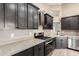Kitchen with stainless steel appliances, quartz countertops, and gas range at 3700 N 149Th Ln, Goodyear, AZ 85395