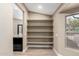 Walk-in pantry with open shelving at 3700 N 149Th Ln, Goodyear, AZ 85395