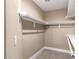 Functional walk-in closet with built-in shelving providing ample storage and organization at 3700 N 149Th Ln, Goodyear, AZ 85395