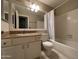 Bathroom with white cabinets, granite counters, shower and tub at 3930 W Monterey St # 115, Chandler, AZ 85226