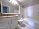 Bathroom featuring a large mirror, vanity with sink, toilet, and bathtub at 3930 W Monterey St # 115, Chandler, AZ 85226