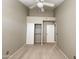 Bedroom with tall ceilings, closet, and ceiling fan at 3930 W Monterey St # 115, Chandler, AZ 85226