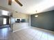 Open floor plan with tile floors, ceiling fan, and a view of the kitchen at 3930 W Monterey St # 115, Chandler, AZ 85226