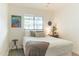 Bright bedroom with a comfortable bed, neutral decor, a window, and cozy carpet flooring at 4312 E Mulberry Dr, Phoenix, AZ 85018