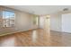 Bright main bedroom with wood laminate flooring and ample natural light at 523 N Ranger Trl, Gilbert, AZ 85234