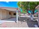This covered patio offers a relaxing outdoor space with low maintenance gravel at 6041 E Colby St, Mesa, AZ 85205