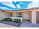 Inviting front porch showcases desert landscaping and wrought iron accents, a cozy entryway at 6041 E Colby St, Mesa, AZ 85205