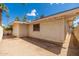 View of the backyard featuring privacy wall and desert landscaping at 617 W Gibraltar Ln, Phoenix, AZ 85023