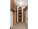 Walk-in closet featuring wooden shelving at 617 W Gibraltar Ln, Phoenix, AZ 85023
