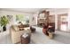Bright living room with a fireplace and neutral color palette, offering a cozy atmosphere at 617 W Gibraltar Ln, Phoenix, AZ 85023