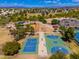 Scenic park view featuring basketball and tennis courts, surrounded by lush trees and open space at 617 W Gibraltar Ln, Phoenix, AZ 85023