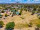 Overhead view of the park showcasing tennis courts, playground, picnic areas, and open spaces for leisure at 617 W Gibraltar Ln, Phoenix, AZ 85023