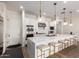Bright modern kitchen with white cabinetry, quartz countertops, and stainless steel appliances at 7343 E Casitas Del Rio Dr, Scottsdale, AZ 85255