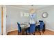 Dining area with hardwood floors, modern decor, and a window providing natural light at 8222 E Sheridan St, Scottsdale, AZ 85257