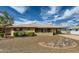 Charming single story home with low maintenance desert landscaping and a covered carport at 8222 E Sheridan St, Scottsdale, AZ 85257