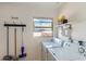 Functional laundry area with a window, washer, and dryer at 8222 E Sheridan St, Scottsdale, AZ 85257