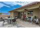 Inviting covered patio with dining and seating areas, perfect for outdoor relaxation and entertaining at 8222 E Sheridan St, Scottsdale, AZ 85257