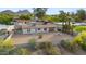 Aerial showcasing backyard with desert landscaping, patio, and views of mountain at 845 E Village Circle S Dr, Phoenix, AZ 85022