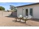 Inviting backyard patio space, complete with modern chairs, decorative plants, and easy access through double doors at 845 E Village Circle S Dr, Phoenix, AZ 85022