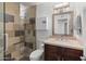 Modern bathroom with a glass-enclosed shower, sleek vanity, and neutral decor at 845 E Village Circle S Dr, Phoenix, AZ 85022