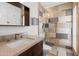 Modern bathroom with a glass-enclosed shower, sleek vanity, and neutral decor at 845 E Village Circle S Dr, Phoenix, AZ 85022