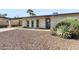 Charming home featuring desert landscaping and a well-maintained facade with a covered parking area at 845 E Village Circle S Dr, Phoenix, AZ 85022
