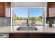 Bright kitchen sink with stainless fixtures and natural light at 845 E Village Circle S Dr, Phoenix, AZ 85022