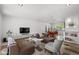 Bright, open living room featuring modern furnishings and ample natural light at 845 E Village Circle S Dr, Phoenix, AZ 85022