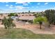 Expansive backyard with a sparkling pool and lush landscaping, ideal for outdoor entertaining at 8542 W Rosemonte Dr, Peoria, AZ 85382