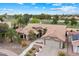Beautiful exterior of home with desert landscaping, walkway, and three car garage at 8542 W Rosemonte Dr, Peoria, AZ 85382
